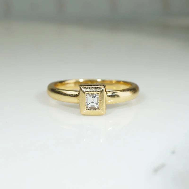 infinity wedding bands for women -Emerald Cut Diamond in 18k Gold Bezel Solitaire Ring